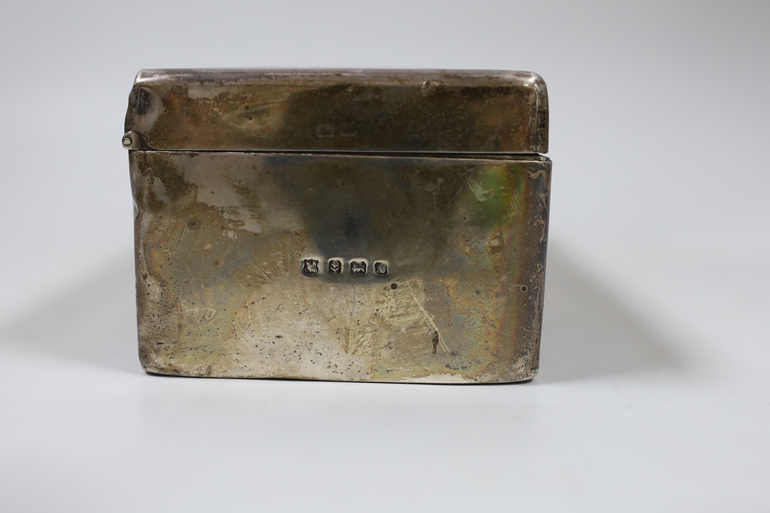 A George V silver mounted cigarette box, with engraved inscription, Birmingham, 1925, 17.5cm.